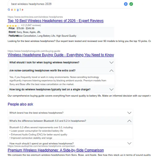 Google search results page showing rich snippets including star ratings and FAQ dropdowns